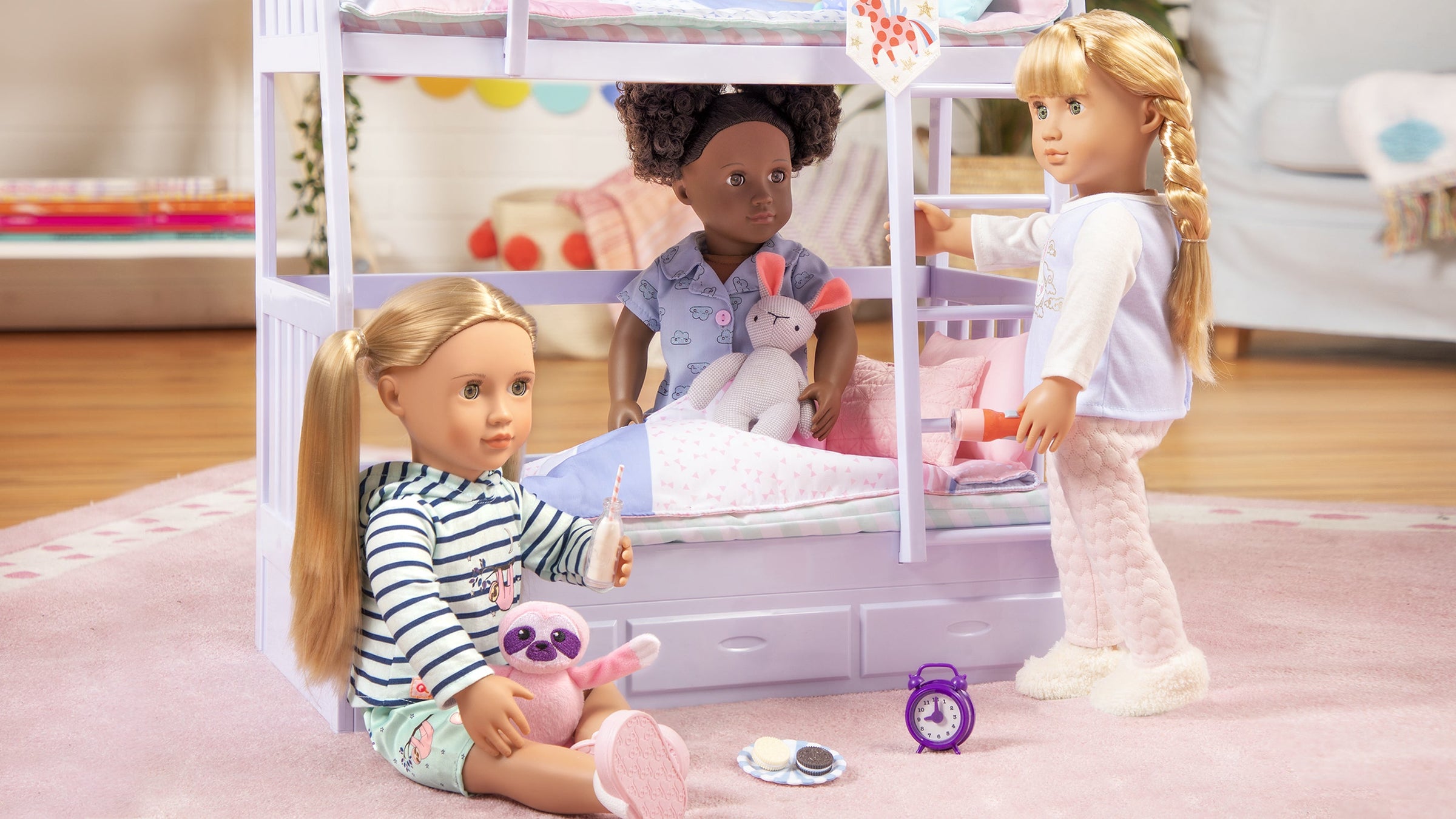 Three Dolls Playing with a Lilac Bunk Bed Playset