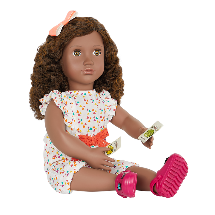 18-inch doll with brown hair, hazel eyes, gardening accessories and storybook