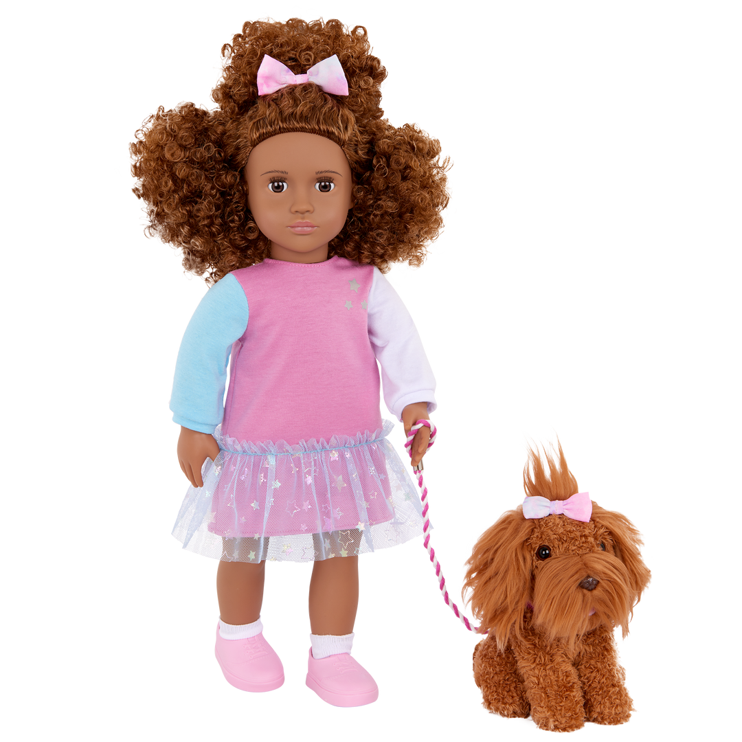 Our Generation Safie & Ginger a 18 inch doll with brown hair and brown eyes with a brown barbet pup