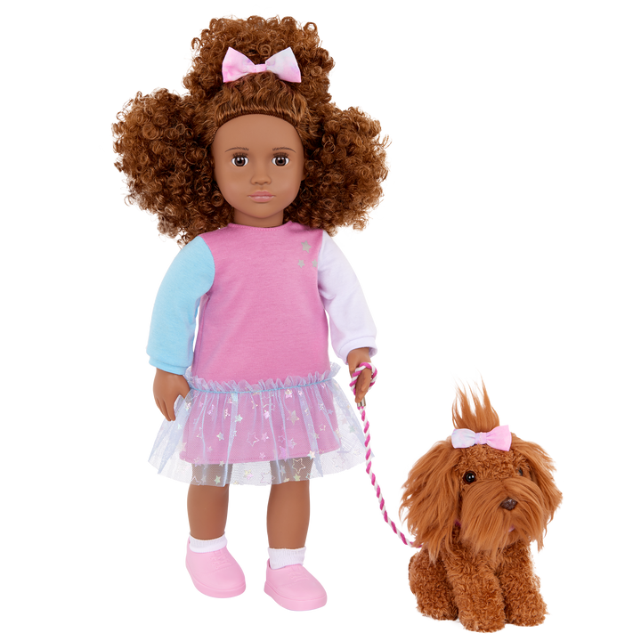 Our Generation Safie & Ginger a 18 inch doll with brown hair and brown eyes with a brown barbet pup