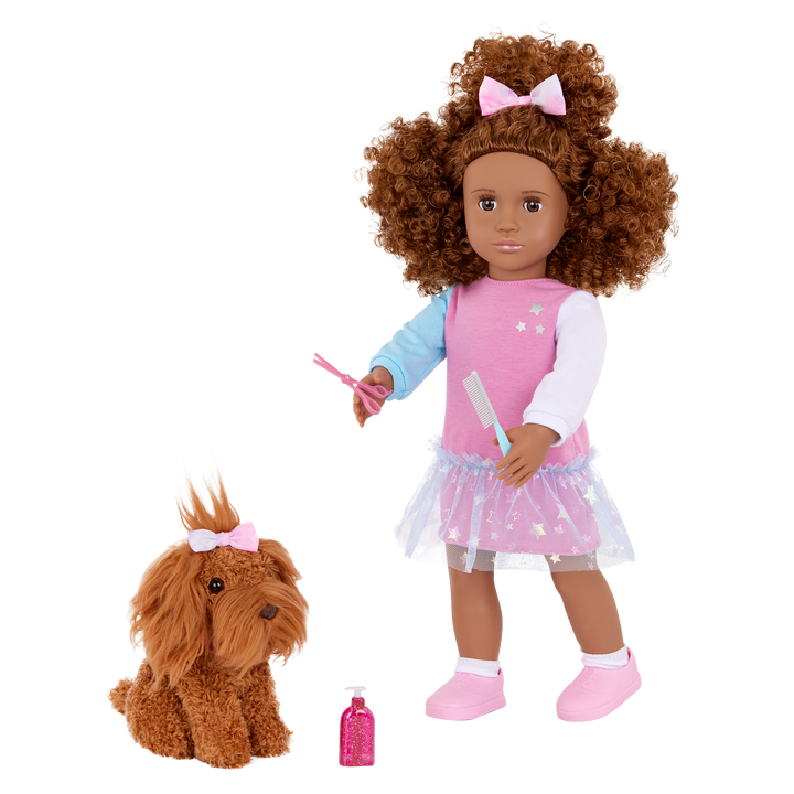 Our Generation Safie & Ginger a 18 inch doll with brown hair and brown eyes with a brown barbet pup