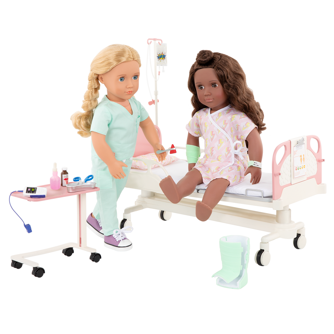 Two 18-inch dolls with hospital gurney playset
