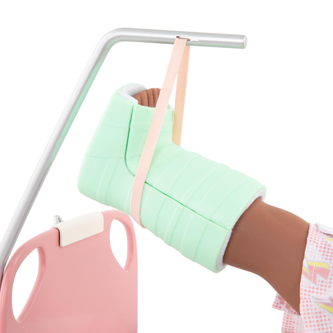 Two 18-inch dolls with hospital gurney playset