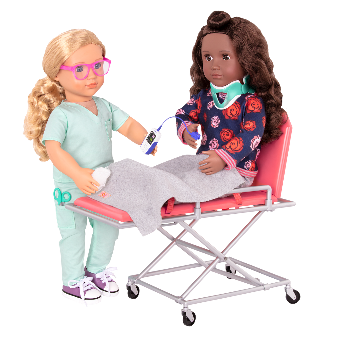 Two 18-inch dolls using ambulance gurney